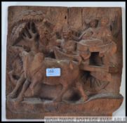 A 19th / 20th century possibly Indonesian carved panel,