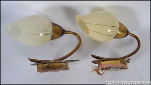 A pair of mid century vintage wall lights,
