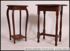 An early 20th century oak occasional table with shaped legs united by a lower tier along with