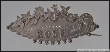 A Victorian Chester hallmarked silver sweetheart brooch pin with the registration mark Rd 171781