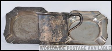 2 silver hallmarked ashtrays together with a silver hallmarked tankard cup.