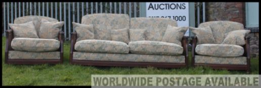 An excellent quality Ercol Bergere three piece conservatory suite in beech and elm,