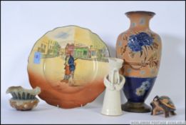 A Royal Doulton vase together with another Royal Doulton dish along with other ceramics .