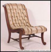 An early 20th century open frame nursing chair,