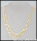 A vintage ladies double graduated pearl choker necklace on silver and marcasite. Total weight 27.