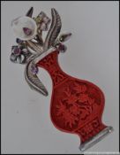 A beautiful Sajen designed silver and coral ladies costume brooch.
