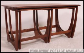 A 1970's G-Plan rectangular Kelso nest of tables. THe large table with 2 tables underneath.