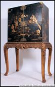 A stunning 19th Century Chinese export lacquered chinoserie decorated cabinet stand / marriage