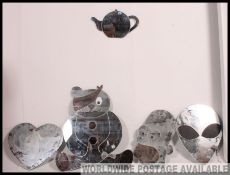 A collection of 20th century mirrors ( frameless ) to include Homer Simpson, Pudsey Bear, Teacup,