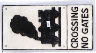 A large vintage style cast iron reproduction Railway Crossing sign.