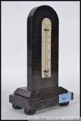 A fabulous early 20th century marble thermometer with ivorive backplate marked for the Marble &