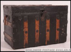 A fabulous 19th century american steamer trunk within canvas and wooden bindings having makers