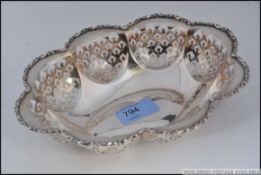 A late Victorian pierced and cast silver basket / bon dish hallmarked for Birmingham 1900 by B&S.