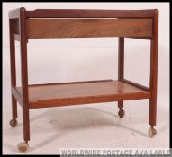 A 1970's Danish influence retro teak wood butlers serving trolley.