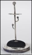 A silver hallmarked hat pin and ring holder,