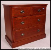 A good quality Edwardian style inlaid chest of drawers having 2 short drawers over 2 deep