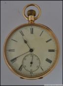 An 18ct gold open faced crown wind pocket watch having subsiduary seconds dial,