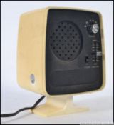 A vintage unusual Japanese made TV shaped retro AM table radio clock.