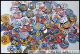 A collection of retro pin badges all pertaining to music to include artists such as X-Ray Spex,