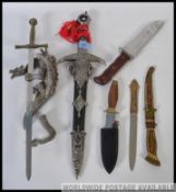 A collection of knives to include hunting and Medieval style etc. please see images for details.