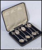 A set of 20th century white metal (stamped 900 indicating silver content) Jerusalem themed holy