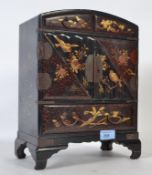 A vintage chinoserie decorated Chinese oriental lacquered jewellery cabinet,
