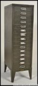 A vintage / retro industrial painted metal office 15 drawer filing cabinet of pedestal form with