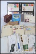 A collection of three stamp albums with stamps from around the world, Cigarette card albums,