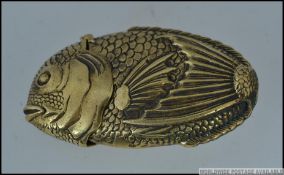 A bronze vesta case in the form of a fish L7cm