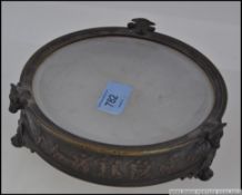 An unusual 19th century brass and frosted glass ashtray.