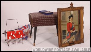 A retro stool along with a large commemorative picture frame ,
