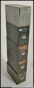A collection of five vintage mid century painted industrial index modular / desk top filing