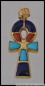 An 18ct gold Egyptian Nem Ankh - key of life pendant with inset turquoise, lapis lazuli,