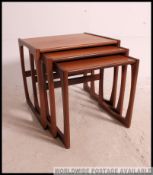 A set of retro vintage 1960's G-Plan nest of tables. Graduating three sized tables.