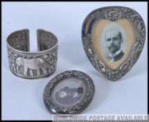 Two silver hallmarked silver easel picture frames,