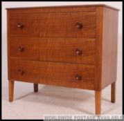 An original Gordon Russell walnut chest of drawers and matching bedside cabinet.