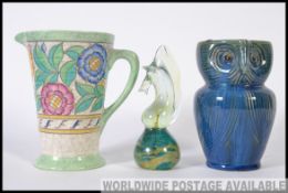 An unusual signed Deby jug in the form of an owl together with a Mdina art glass sculpture and an