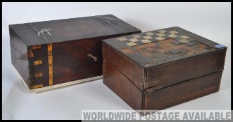 Two 19th century writing slopes. One with checkerboard top and the other with lovely brass bindings.