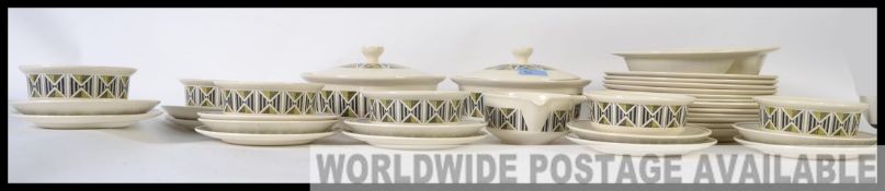 Wedgwood 'Diamond' dinner service from the 1960's . Asymmetric green and black pattern.