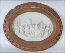 A believed 19th century cast plaster plaque in relief of neo-classical town / people scape being