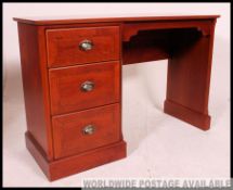 A good quality Edwardian style inlaid mahogany dressing table by Olympus Furniture.