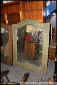 A large contemporary overmantel wall mirror having a whicker / rattan weave frame together with