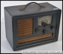 Early Decca radio in bakelite, great looking piece. Contains several valves to rear.