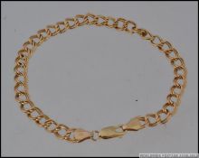 An Italian chain link 9ct gold (marked 375) bracelet. Stamped for Italy.