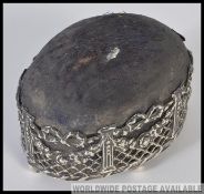 A silver hallmarked pin cushion of oval form,