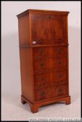 A good quality antique style yew wood drinks cabinet.