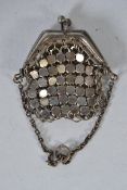 A silver ladies sovereign mesh purse with chain Total weight 13g.