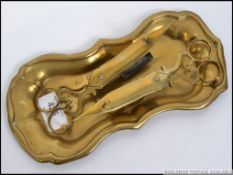 A pair of early 19th century Georgian brass scissor type candle snuffers on the original lozenge