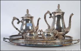 A good quality 4 piece silver plated tea service comprising good salver tray with teapot,