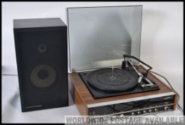 A retro 1970's record deck by Marconiphone model Unit 3 together with a single Marantz speaker